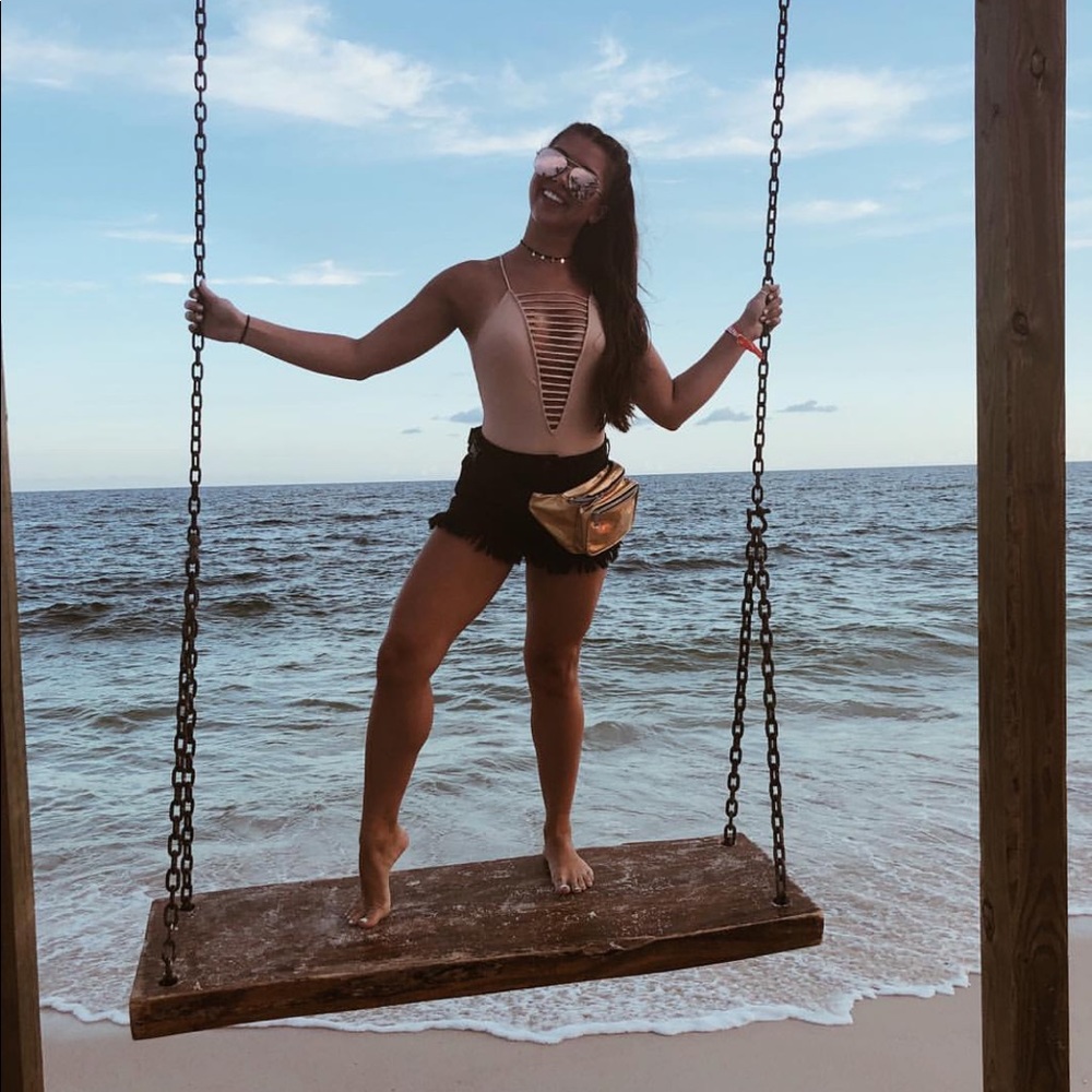 nude strappy one-piece swimsuit